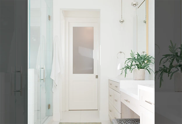 Bathroom pocket door with satin etch glass