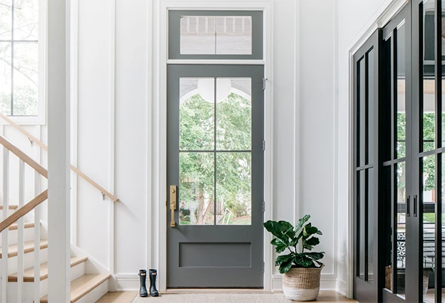 Sage painted door with matching transom and WaterBarrier Technology