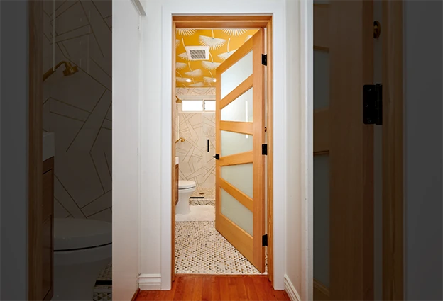 Douglas fir door in modern bathroom with glass