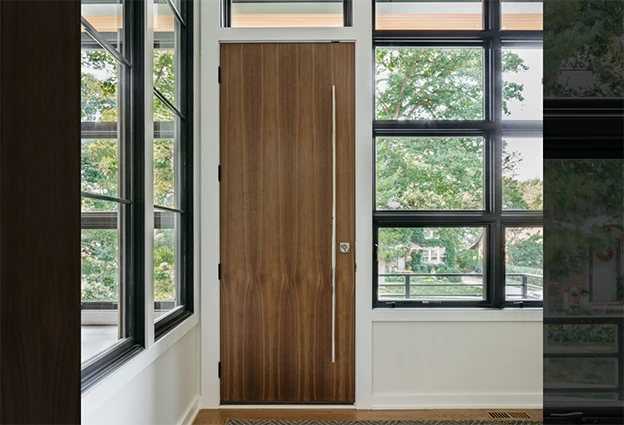 Walnut modern door with silver pull handle