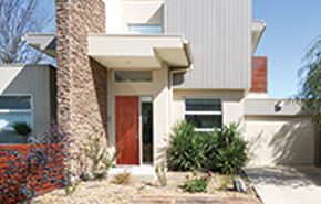 Entrance with contemporary sapele mahogany front door