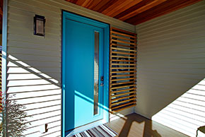 Entrance with wood contemporary exterior door
