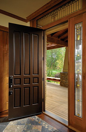 Entryway with wood front door