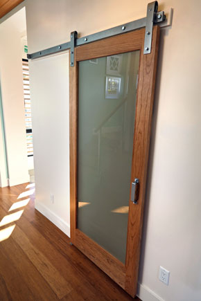 Interior fir french door on barn track