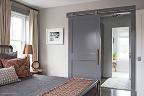 Bedroom with interior barn door
