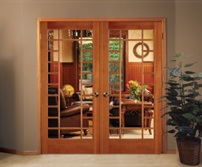 Den with Interior wood french doors