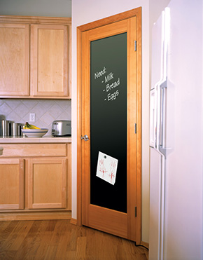 Kitchen with chalk board panel door, shown in fir