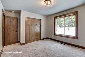 Bedroom with knotty alder interior doors