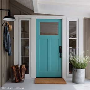Entryway with wood front door