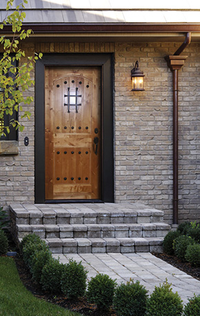 entryway with knotty birch exterior door