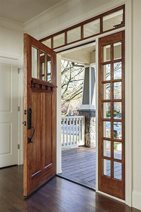 Entryway with fir front door