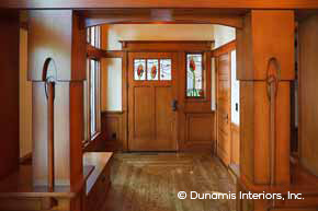 Entryway with wood front door