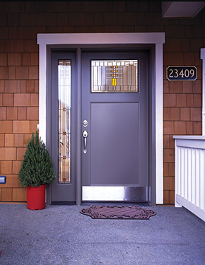 Entryway with wood front door
