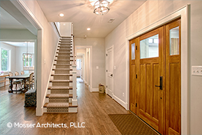 Entryway with fir front door and sidelights