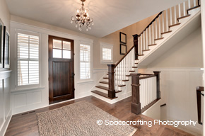 Entryway with fir front door