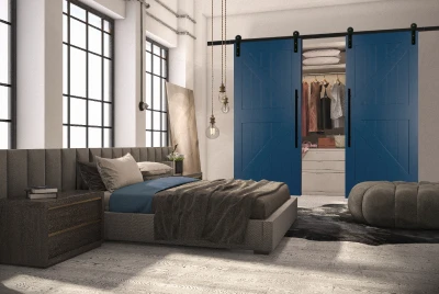 Double doors on barn track painted blue for bedroom closet