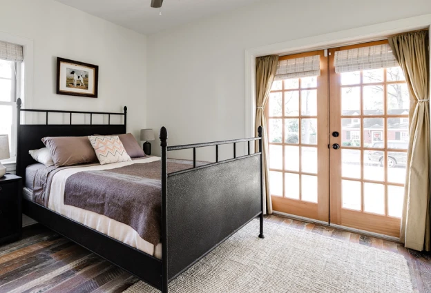French doors in bedroom constructed with Douglas fir